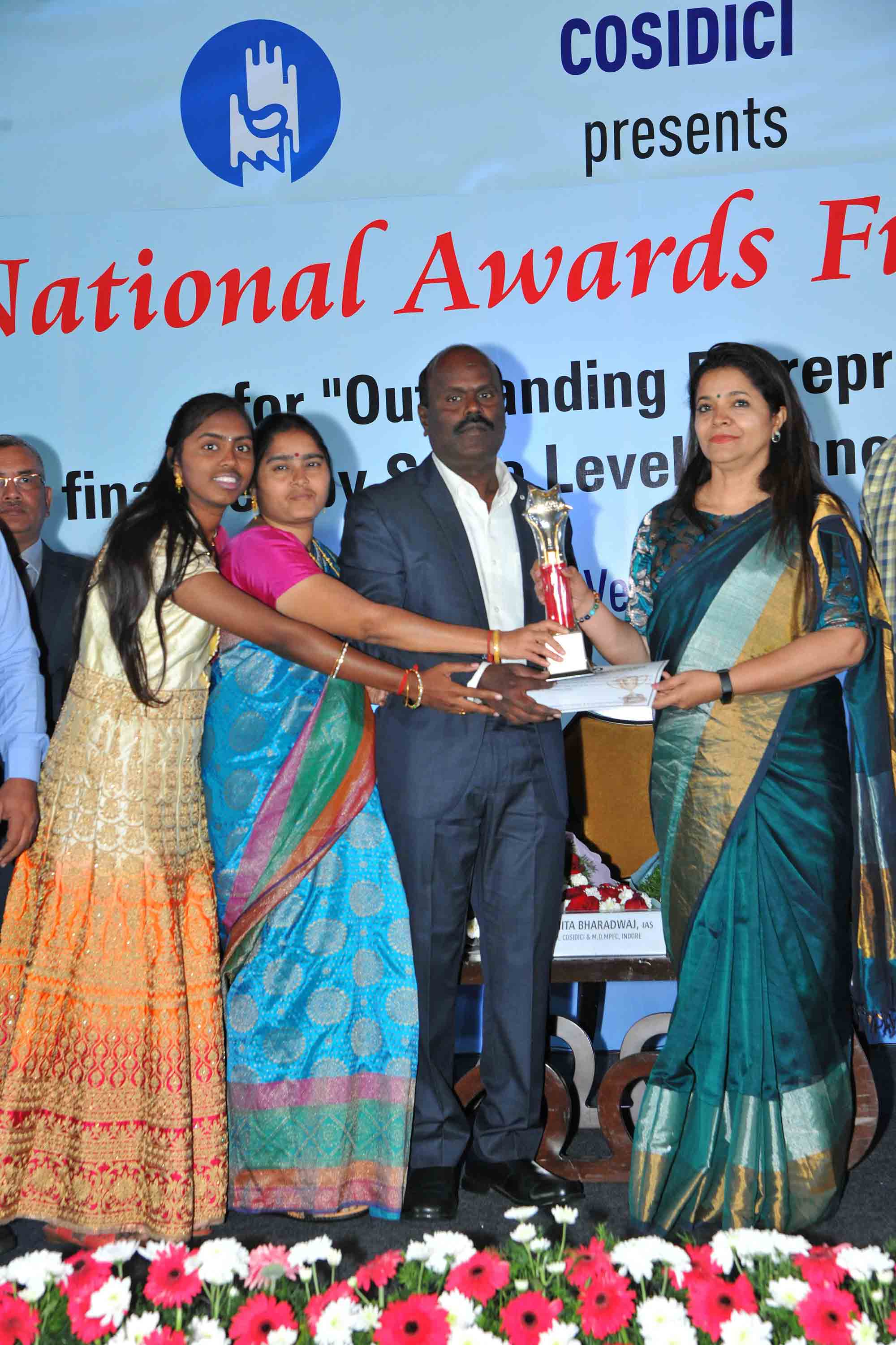  - Promoter of Excellent Hi-Care Pvt Ltd ,Villupuram, receiving Best First Generation Entrepreneur Award from COSIDICI during its National Awards 2019 Program held at Bengaluru